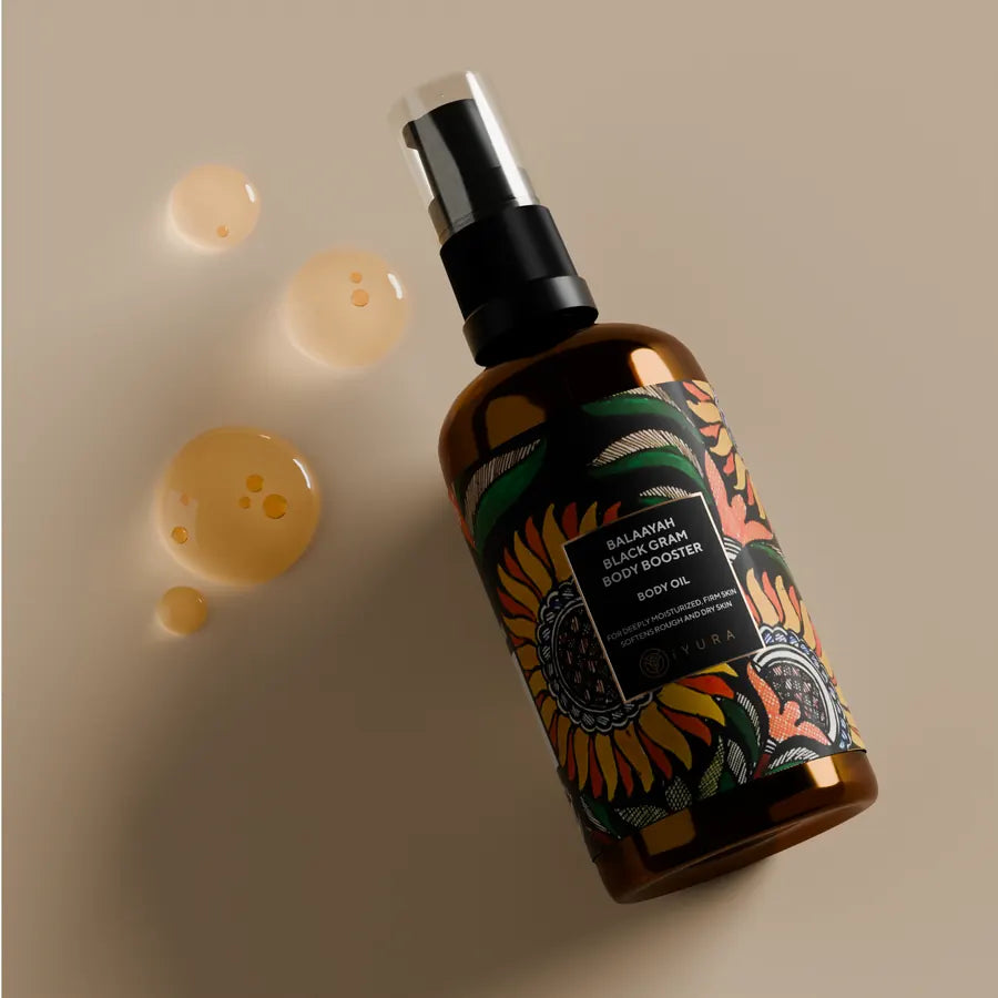 The bottle standing among amber droplets