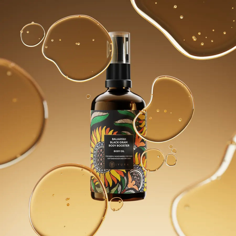 The bottle among floating amber droplets of oil